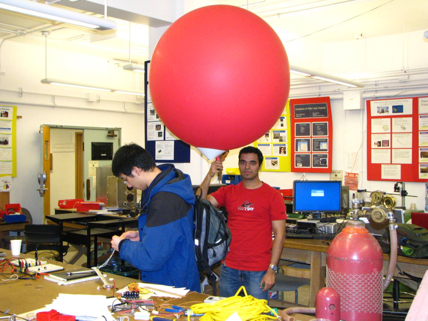holding the helium balloon